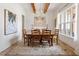Formal dining room features chandelier, hardwood floors, and large windows at 1505 Montvale Grant Way, Cary, NC 27519