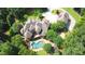 Luxury home with pool and large lot surrounded by trees at 15508 Possum Track Rd, Raleigh, NC 27614