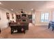 Spacious basement recreation room with stone fireplace at 15508 Possum Track Rd, Raleigh, NC 27614