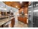 Basement kitchen with granite counters and stainless steel appliances at 15508 Possum Track Rd, Raleigh, NC 27614