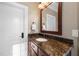 Bathroom with granite countertop and updated vanity at 15508 Possum Track Rd, Raleigh, NC 27614