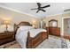 Main bedroom with large bed and dresser at 15508 Possum Track Rd, Raleigh, NC 27614