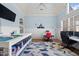 Bright craft room with large work table, computer station, and cheerful decor at 15508 Possum Track Rd, Raleigh, NC 27614