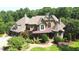 Grand two-story home with stone and brick accents at 15508 Possum Track Rd, Raleigh, NC 27614