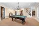 Basement recreation area with a pool table and jukebox at 15508 Possum Track Rd, Raleigh, NC 27614