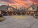 Large 6-car garage with helicopter pad at 15508 Possum Track Rd, Raleigh, NC 27614