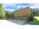 Triple car garage with brick exterior at 15508 Possum Track Rd, Raleigh, NC 27614
