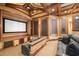 Home theater with large screen, comfortable seating, and recessed lighting at 15508 Possum Track Rd, Raleigh, NC 27614