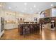 Gourmet kitchen with island, granite countertops, and stainless steel appliances at 15508 Possum Track Rd, Raleigh, NC 27614