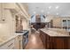 Spacious kitchen boasts granite countertops and high-end stainless steel appliances at 15508 Possum Track Rd, Raleigh, NC 27614