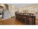 Elegant kitchen with island seating and built-in appliances at 15508 Possum Track Rd, Raleigh, NC 27614