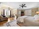 Spacious main bedroom with sitting area and large windows at 15508 Possum Track Rd, Raleigh, NC 27614