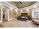 Spacious main bedroom with high ceiling, king bed, and walk-in closet at 15508 Possum Track Rd, Raleigh, NC 27614