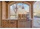 Stainless steel grill and side burner in outdoor kitchen at 15508 Possum Track Rd, Raleigh, NC 27614