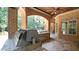 Brick outdoor kitchen with built-in grill and bar at 15508 Possum Track Rd, Raleigh, NC 27614