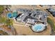 Aerial view of community amenities including pool, clubhouse, and tennis courts at 1626 Plover Cir, Fuquay Varina, NC 27526
