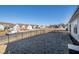 Fenced backyard with view of neighboring homes at 1626 Plover Cir, Fuquay Varina, NC 27526