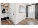 Bright entryway with built-in bench, cubbies, and shelving at 1626 Plover Cir, Fuquay Varina, NC 27526