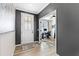 Bright hallway with a view into home office and front door at 1626 Plover Cir, Fuquay Varina, NC 27526