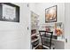 Well-lit home office with built-in shelving and desk at 1626 Plover Cir, Fuquay Varina, NC 27526