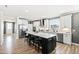 Modern kitchen with granite countertops and white cabinets at 1626 Plover Cir, Fuquay Varina, NC 27526