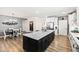 Open kitchen with a large island and breakfast area at 1626 Plover Cir, Fuquay Varina, NC 27526