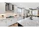 Gourmet kitchen with stainless steel appliances and granite island at 1626 Plover Cir, Fuquay Varina, NC 27526