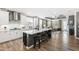 Modern kitchen with granite island, stainless steel appliances, and white cabinetry at 1626 Plover Cir, Fuquay Varina, NC 27526