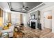 Bright living room with a fireplace and hardwood floors at 1626 Plover Cir, Fuquay Varina, NC 27526