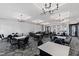 Meeting room with multiple tables and chairs at 1626 Plover Cir, Fuquay Varina, NC 27526