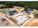 Aerial view showcasing community amenities, including a pool and tennis courts at 1705 Clydner Dr, Cary, NC 27523