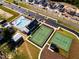 Aerial view showing pool, tennis, and pickleball courts at 1705 Clydner Dr, Cary, NC 27523