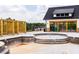 Unfinished community pool area featuring a black metal fence and wood features at 1705 Clydner Dr, Cary, NC 27523
