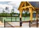 View of well-maintained community tennis courts with a covered gazebo at 1705 Clydner Dr, Cary, NC 27523
