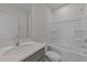 Clean bathroom with a white bathtub, shower, and vanity at 20 Windflower Ct, Clayton, NC 27520