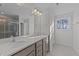 Double vanity bathroom with large mirror and shower at 20 Windflower Ct, Clayton, NC 27520