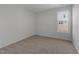 Simple bedroom with neutral walls and carpet flooring at 20 Windflower Ct, Clayton, NC 27520