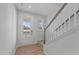Bright and airy foyer with stairs leading to the second floor and front door access at 20 Windflower Ct, Clayton, NC 27520