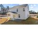 Two-story house with covered patio and yard at 20 Windflower Ct, Clayton, NC 27520