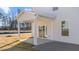 Rear view of house showing patio and siding at 20 Windflower Ct, Clayton, NC 27520