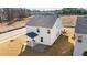 Two-story house with covered patio and yard at 20 Windflower Ct, Clayton, NC 27520