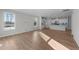 Spacious living area with hardwood floors and kitchen view at 20 Windflower Ct, Clayton, NC 27520