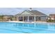 Community pool with lounge chairs and outdoor seating offers residents a place to relax at 20 Windflower Ct # Homesite 5, Clayton, NC 27520