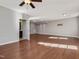 Finished basement with hardwood floors and ceiling fan at 222 Kylemore Cir, Cary, NC 27513