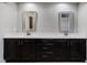 Double vanity bathroom with dark brown cabinets at 222 Kylemore Cir, Cary, NC 27513