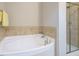 Bathroom with soaking tub and walk-in shower at 222 Kylemore Cir, Cary, NC 27513