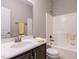 Clean bathroom with shower/tub combo, vanity, and a mirror at 222 Kylemore Cir, Cary, NC 27513
