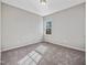 Bright bedroom with carpet, window, and neutral color scheme at 222 Kylemore Cir, Cary, NC 27513