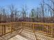 Wooden deck overlooking wooded backyard at 222 Kylemore Cir, Cary, NC 27513