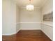 Bright dining room with hardwood floors and chandelier at 222 Kylemore Cir, Cary, NC 27513